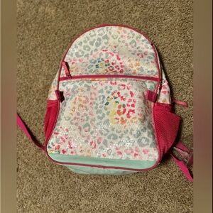 Multi colored backpack. Signs of wear, pet/smoke free home.